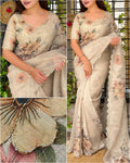 Cutwork outline of sequins bids in saree border