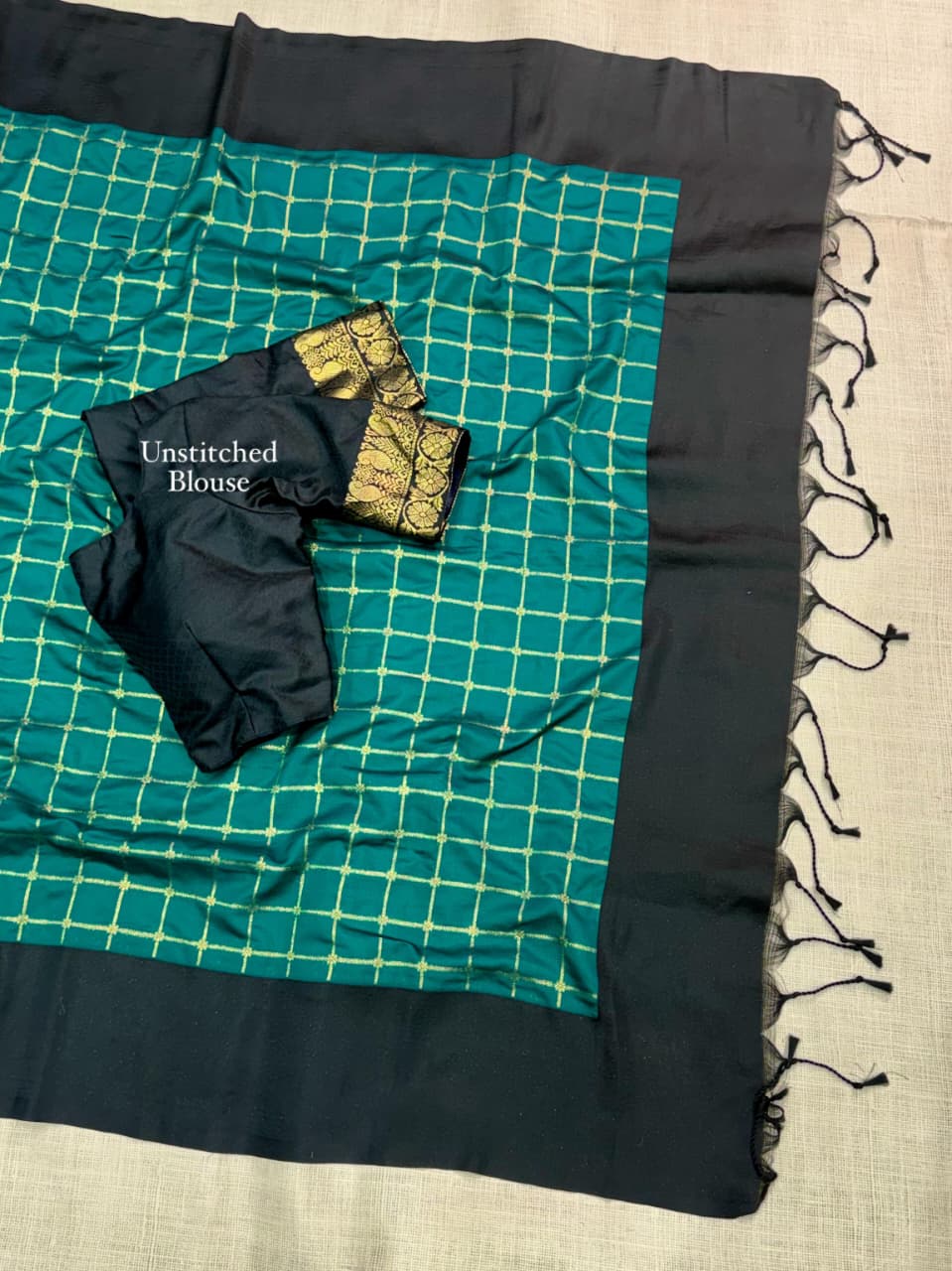 Contrast black satin weaving border in full saree