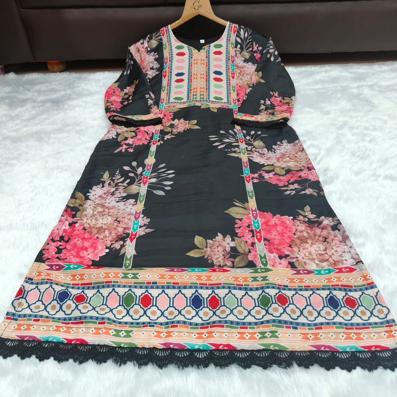 Pakistani Suit which is beautifully decorated with digital prints