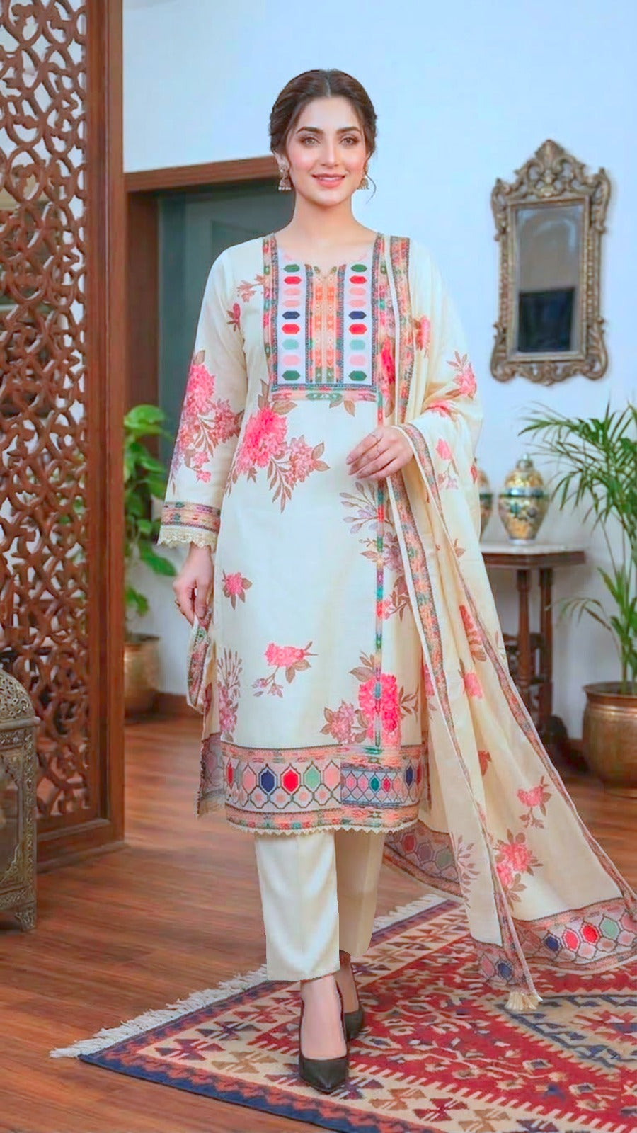 Pakistani Suit which is beautifully decorated with digital prints