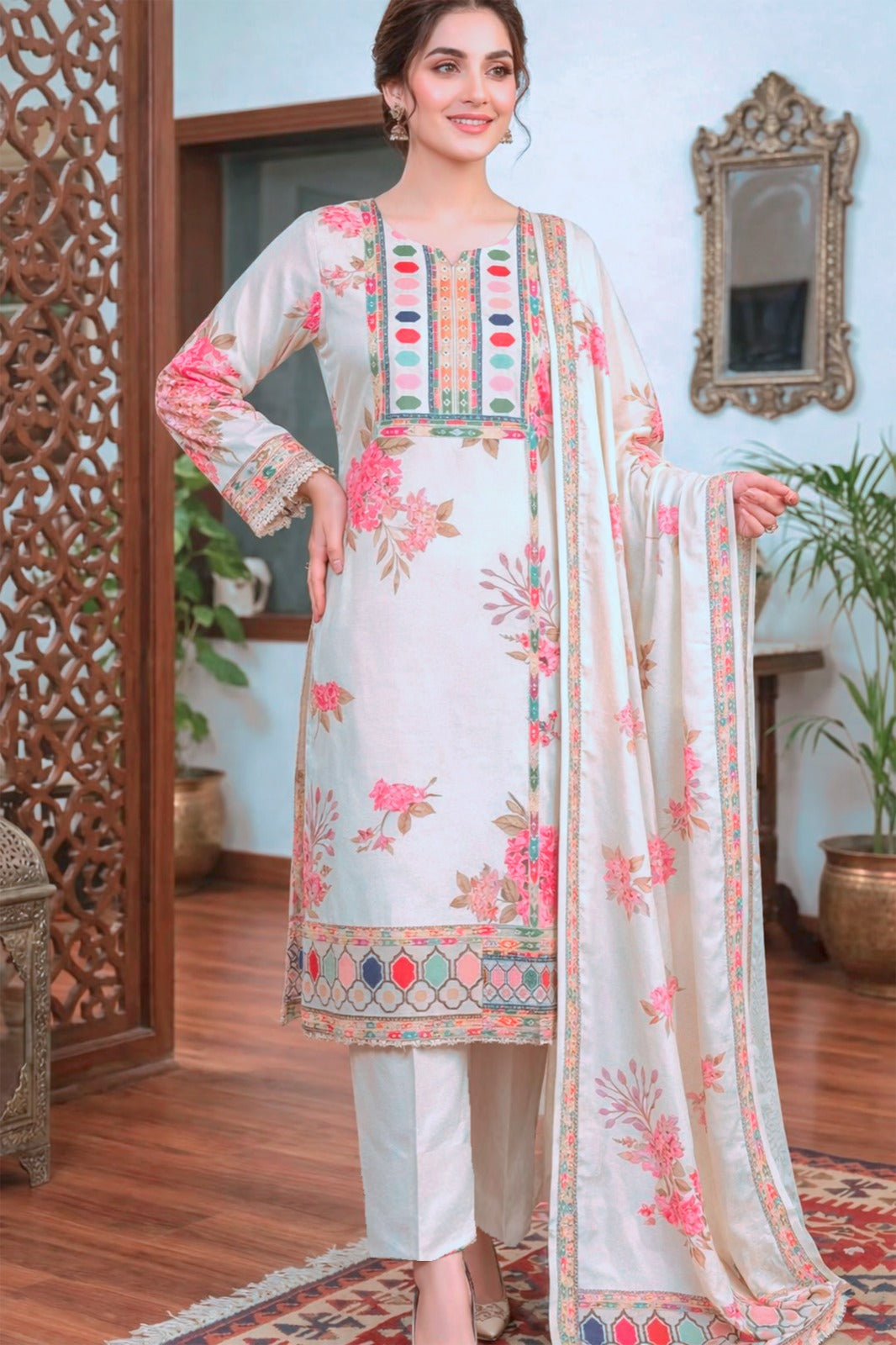 Pakistani Suit which is beautifully decorated with digital prints