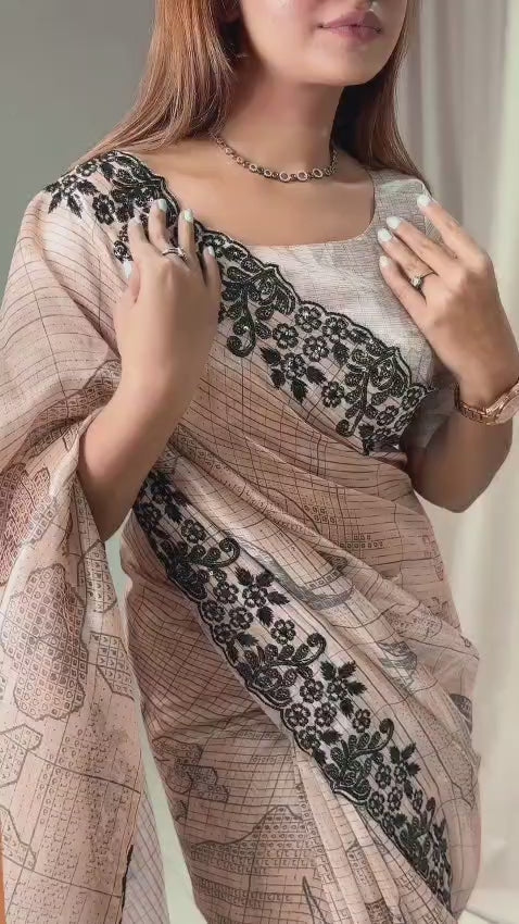Digital print, Black sequins, Embroidered work creates a tapestry of elegance, This piece of Glass organza saree